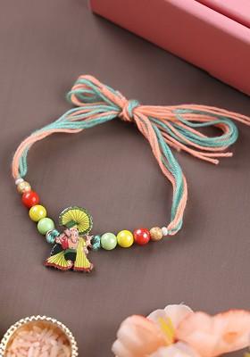 Gold Plated Ganesh Temple Shaped Thread Rakhi With Roli Chawal