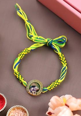 Gold Plated Krishna Shaped Thread Rakhi With Roli Chawal