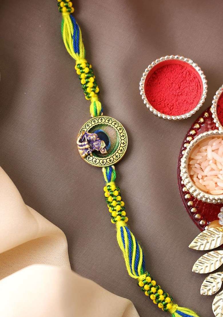 Gold Plated Krishna Shaped Thread Rakhi With Roli Chawal - Indya
