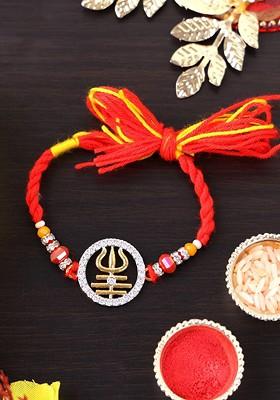 Gold Plated Trident Shaped Beaded Thread Rakhi With Roli Chawal