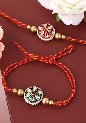 Unisex Gold Plated Set Of 2 Floral Shaped Thread Rakhis With Roli Chawal