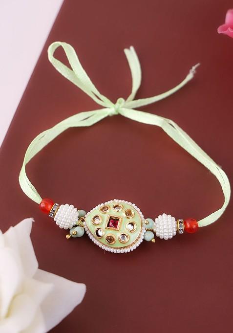 Unisex Gold Plated Beaded With Stone Studded Rakhis And Roli Chawal