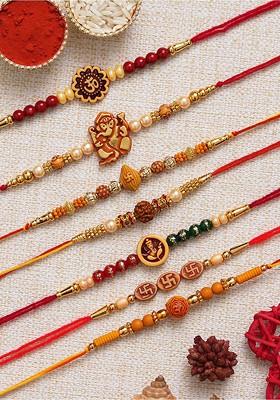 Set Of 7 Om Ganesha Swastik Rudraksha Faux Pearl Rakhis With Roli Chawal