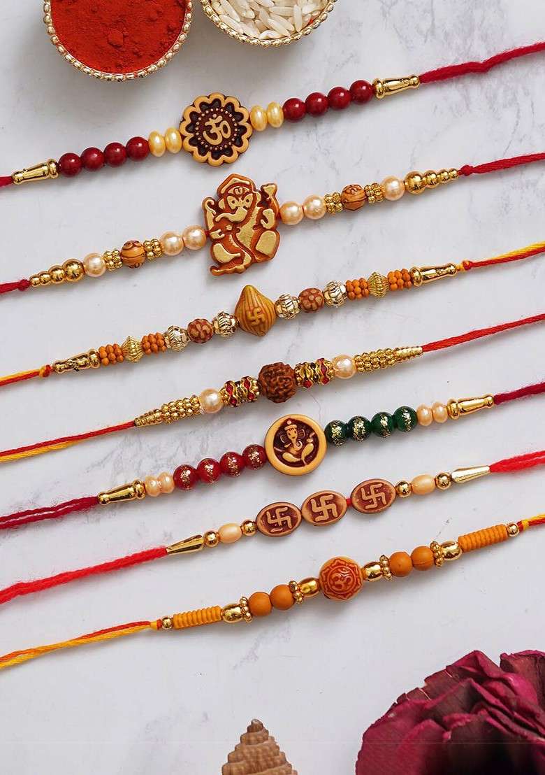 Set Of 7 Om Ganesha Swastik Rudraksha Faux Pearl Rakhis With Roli Chawal - Indya