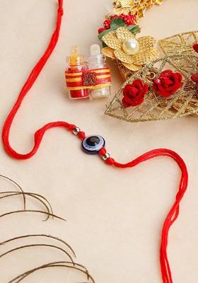 Men Evil Eye Shaped Thread Rakhi With Roli Chawal