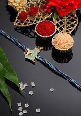 Boys Gold Plated Krishna Shaped Thread Rakhi With Roli Chawal