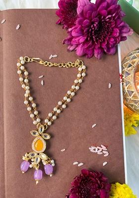 Gold Plated Kundan Studded And Beaded Lumba Rakhi