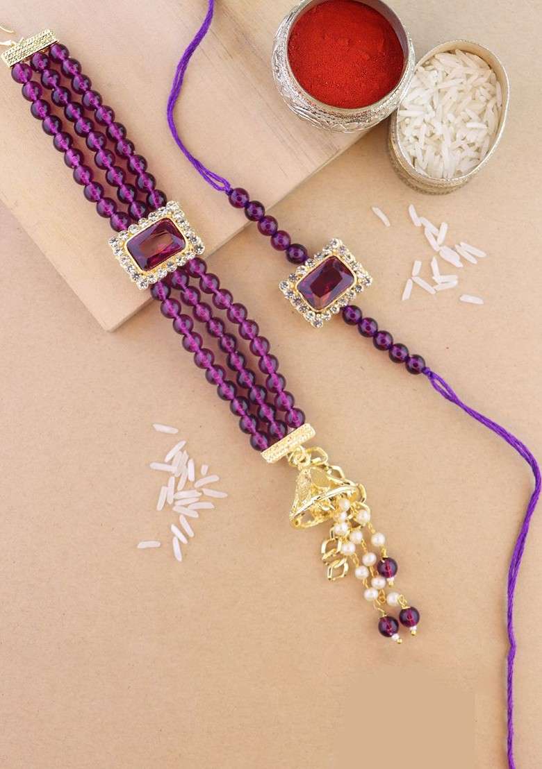 Set Of 2 Kundan Studded And Beaded Lumba And Rakhi With Roli Chawal And Greeting Card - Indya