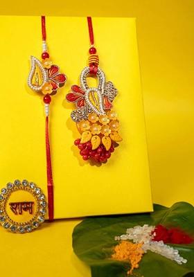 Unisex Set Of 2 Floral Shaped Embellished Rakhi With Roli Chawal