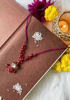 Women Stone Studded And Beaded Lumba Rakhi