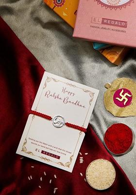 Om Charm Studded Stainless Steel Rust Free Rakhi With Roli Rice Greeting Card