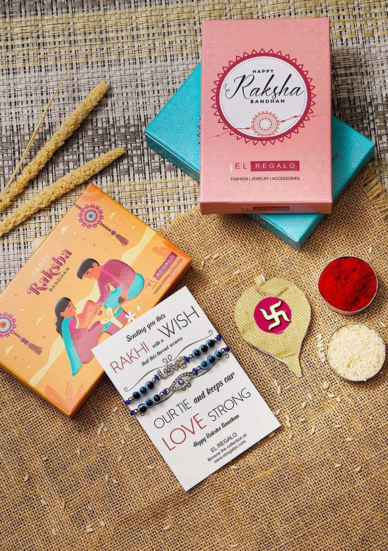 Set Of 2 Evil Eye Rakhi Combo For Bhaiya And Bhabhi With Roli Chawal - Indya
