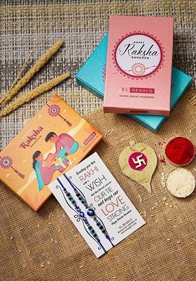 Set Of 2 Evil Eye Rakhi Combo For Bhaiya And Bhabhi With Roli Chawal