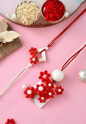 Set Of 2 Pearl And Applique Embellished Bhaiya Bhabhi Rakhi