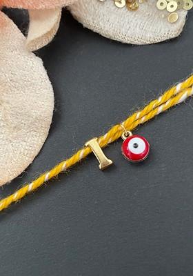 Gold Plated I Alphabet And Evil Eye Charm Rakhi