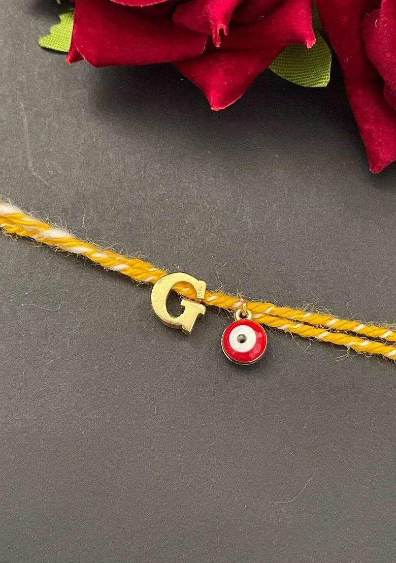 Gold Plated G Alphabet And Evil Eye Charm Rakhi - Indya