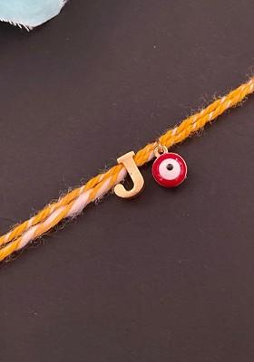 Gold Plated Letter J Alphabet And Evil Eye Charm Rakhi