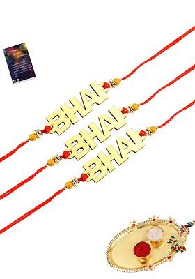 Set Of 3 Red And Gold Toned Rakhi With Roli Chawal Pooja Thali And Greeting Card
