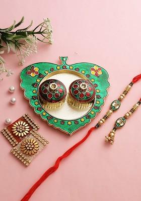 Green And Red Beaded Rakhi With Paan Leaf Shaped Roli Chawal Thali