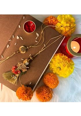 Set Of 2 Red And White Stone Studded Rakhi