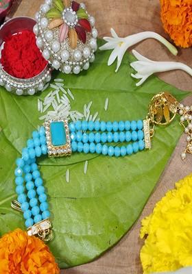 Women Turquoise Blue Pearl Beads Studded Lumba Rakhi
