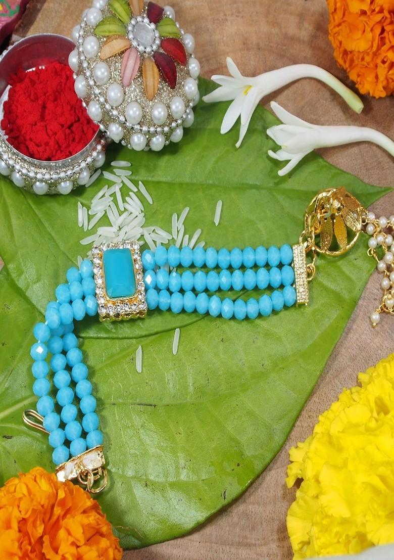 Women Turquoise Blue Pearl Beads Studded Lumba Rakhi