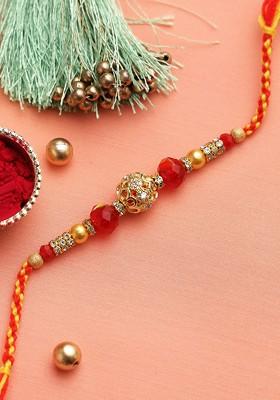 Gold Toned And Red Beaded Rakhi With Roli Chawal And Card