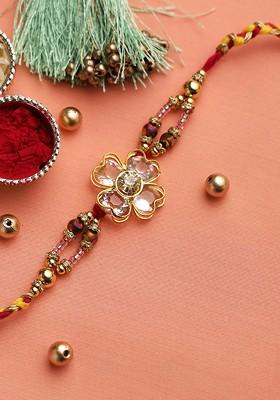 Gold Toned And Red Kundan Beaded Circular Thread Rakhi