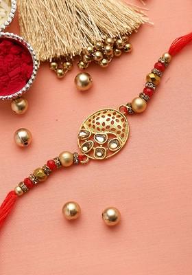 Gold Toned And Red Kundan Stone Rakhi