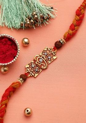 Red And Gold Toned Jewelled Ganapati And Rudraksh Rakhi Set