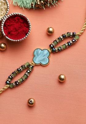 Green And Silver Toned Studded Thread Rakhi