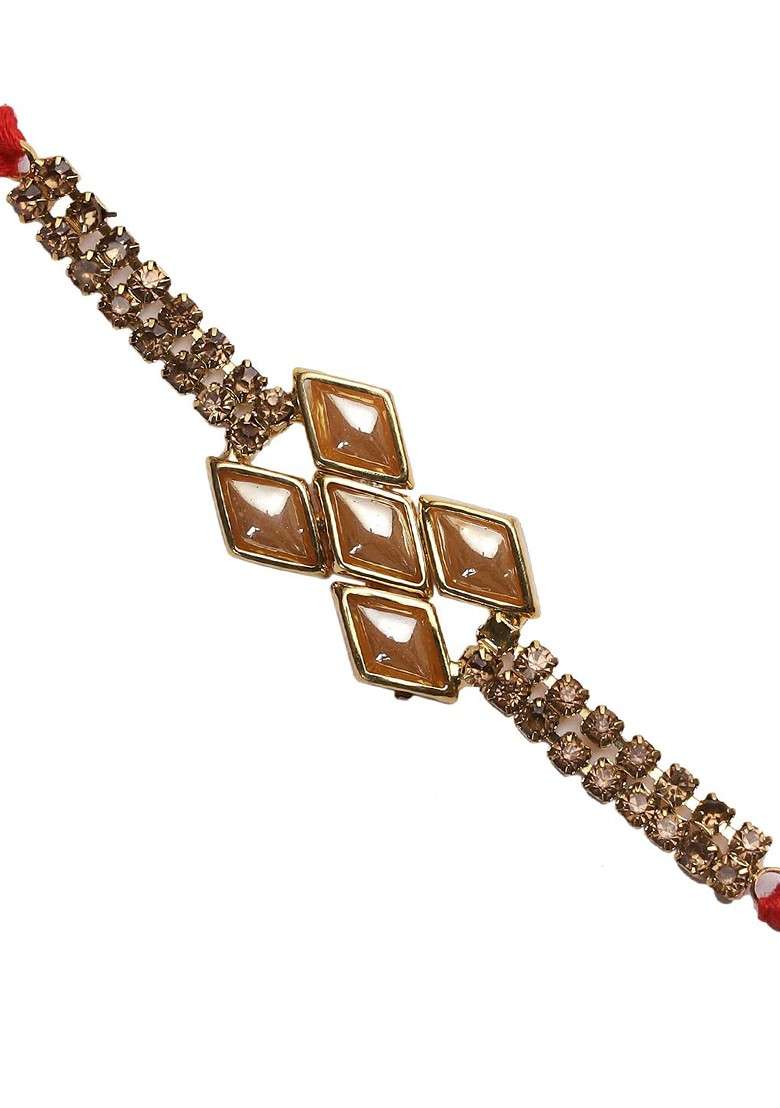Adults Gold Toned And Red Handcrafted Uncut Diamonds Bracelet Style Rakhi - Indya
