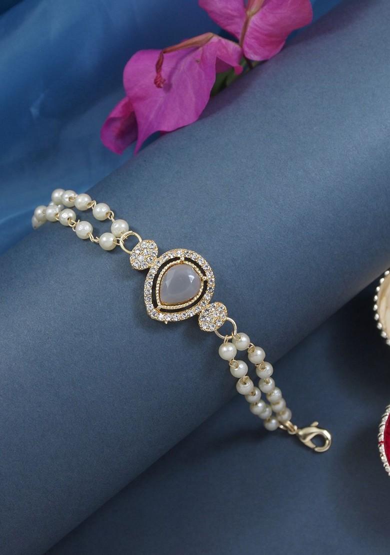 Drop Shaped Kundan And Pearl Lumba Bracelet Rakhi - Indya