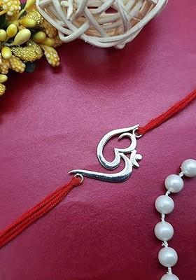 2 Pieces Om Crystal Rakhi And Roli Tilak Gift Set