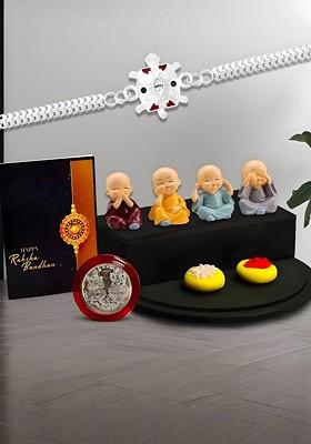 Silver Plated Red And Green Meena Rakhi With Baby Buddha Silver Coin And Greeting Card