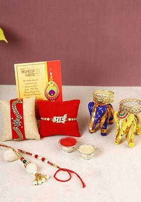 Set Of 4 Rakhi With Cotton Elephant Design Candle Holder