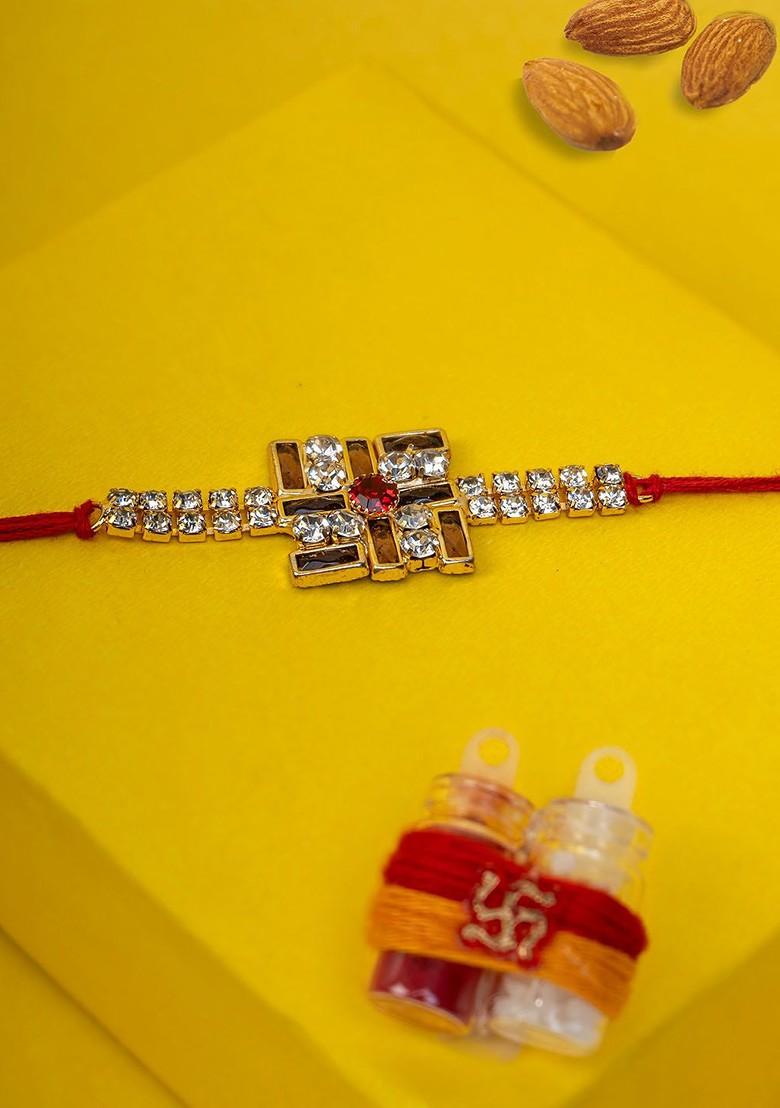 Gold Plated Stone Studded Satya Rakhi With Roli Chawal Gift Set