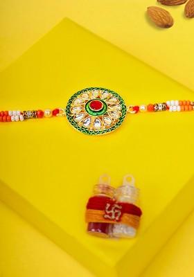 Gold Plated Circular Shaped Kundan Thread Rakhi With Roli Chawal