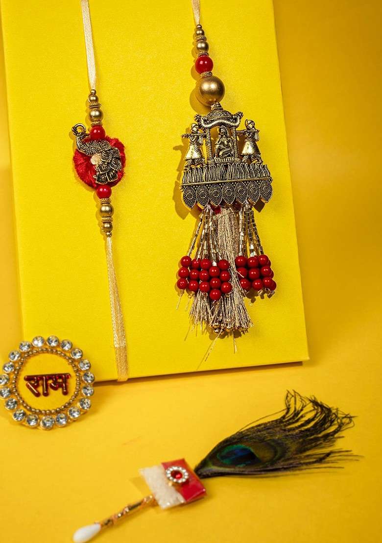 Unisex Set Of 2 Gold Plated Peacock Shaped Bhaiya Bhabhi Embellished Rakhi Gift Set - Indya