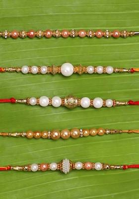 Set Of 5 White And Golden Pearls Rakhis With Roli Chawal Pack