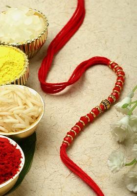 Gold Toned Rakhi Gift Set