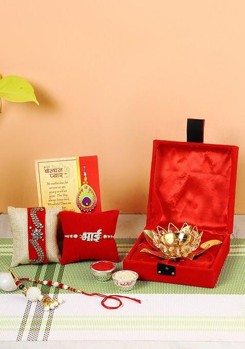 Set Of 4 Rakhi With Lotus Shaped Lamp