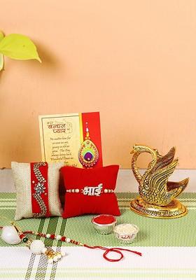 Set Of 4 Rakhi With Metal Swan Showpiece