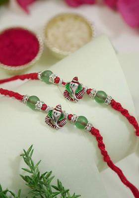 Set Of 2 Lord Ganesha Rakhis With Greeting Card And Roli Chawal
