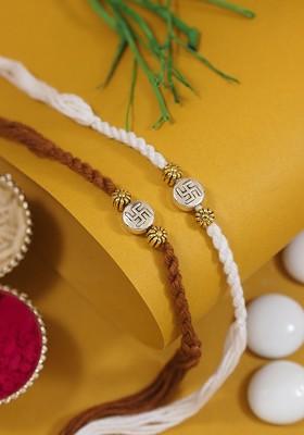 Set Of 2 Swastik Design Rakhi With Greeting Card And Roli Chawal