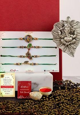 Set Of 5 Thread Rakhi And Metal Ganesha Leaf With Roli Chawal