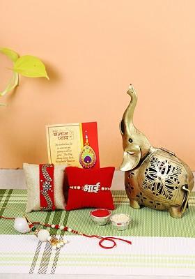 Set Of 4 Rakhi With Gift Elephant Showpiece