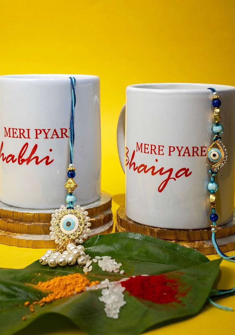 Unisex Set Of 2 Gold Plated Evil Eye Charm Rakhi With Mugs And Roli Chawal - Indya