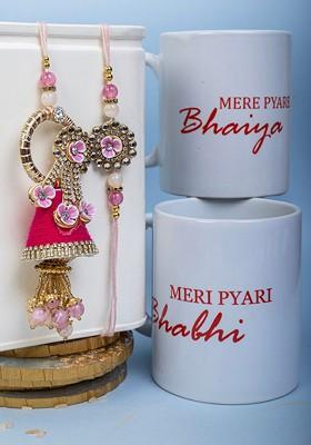 Set Of 2 Gold Plated Rakhi With Two Mug Roli And Rice