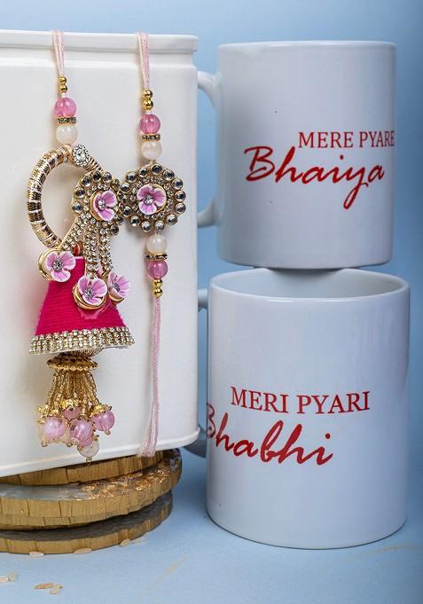 Set Of 2 Gold Plated Rakhi With Two Mug Roli And Rice